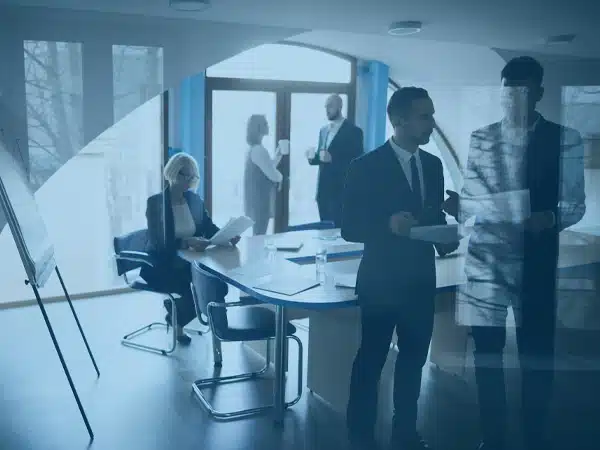 Professionals working together to create staff augmentation plan